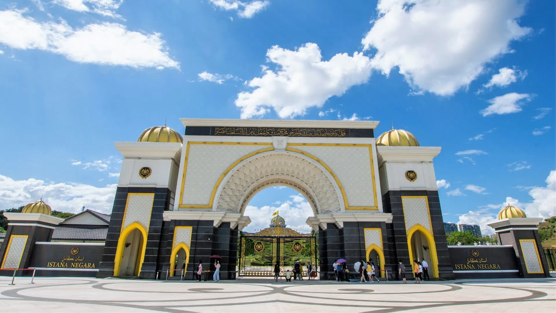 Visitors at the main gate of Istana Negara, Kuala Lumpur